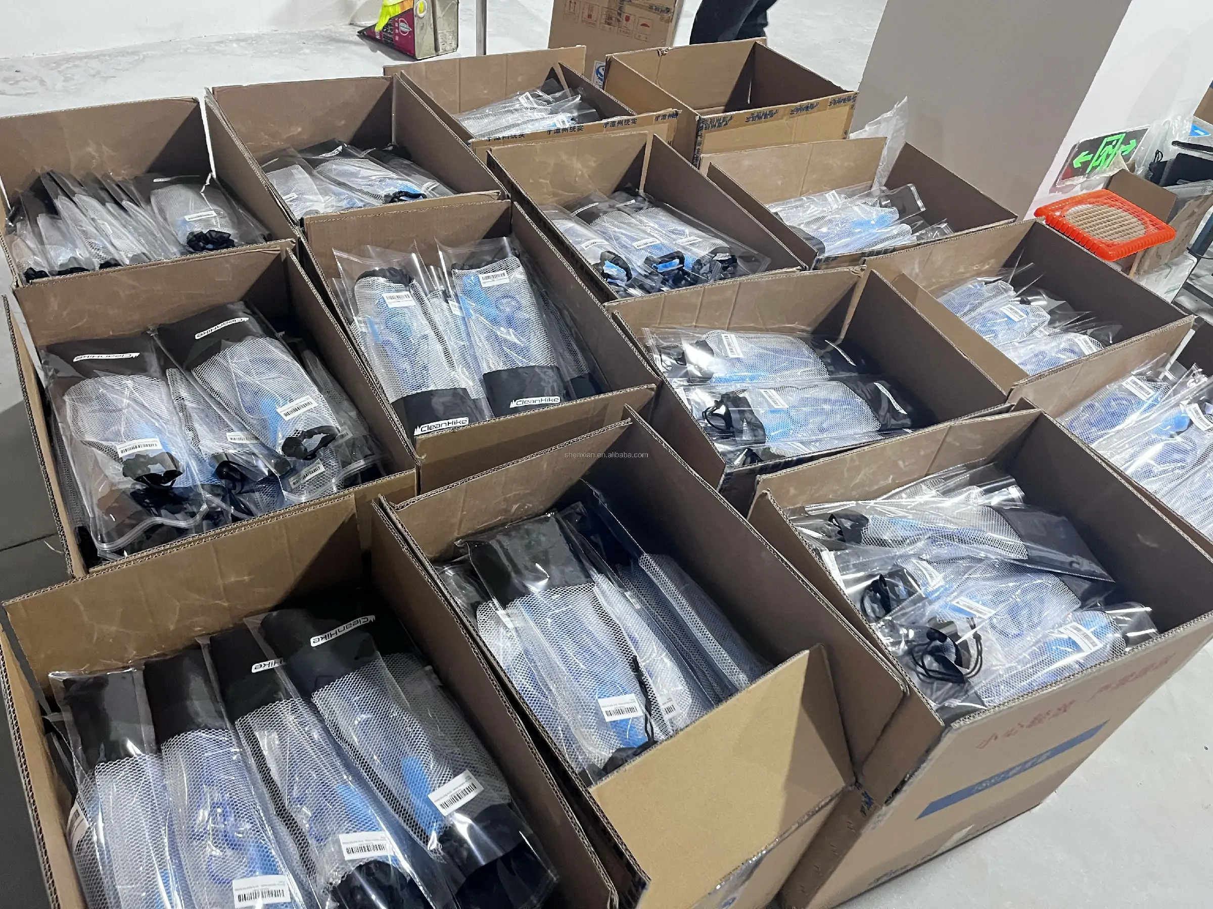 Boxed brush products packed in batches and organized for final labeling and shipment.