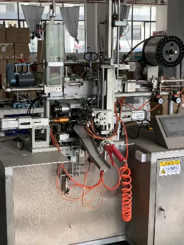 Cleaning brush manufacturing equipment